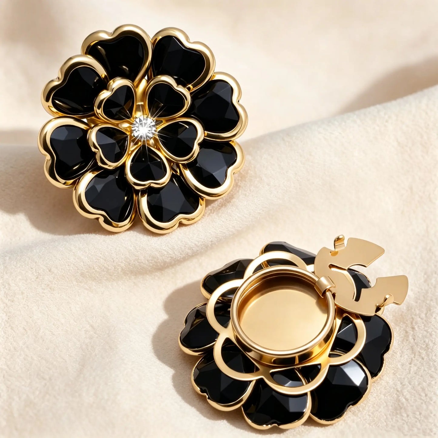 Sophisticated black onyx style layered floral button cover framed with gold edges. The right piece displays the gold open hinge mechanism, demonstrating a no-sew French cuff transformation.