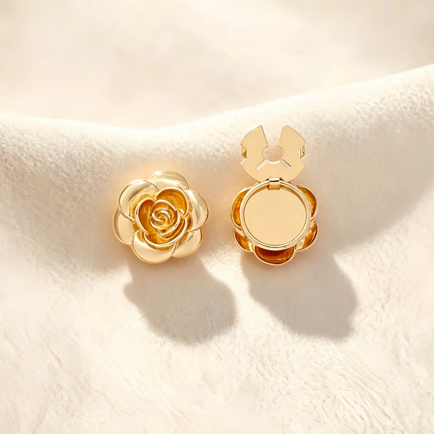 An elegant gold 3D rose button cover featuring intricately layered metallic petals. Set against a cream background, the right piece reveals the open gold clasp, offering a romantic and vintage-inspired upgrade for blouses.