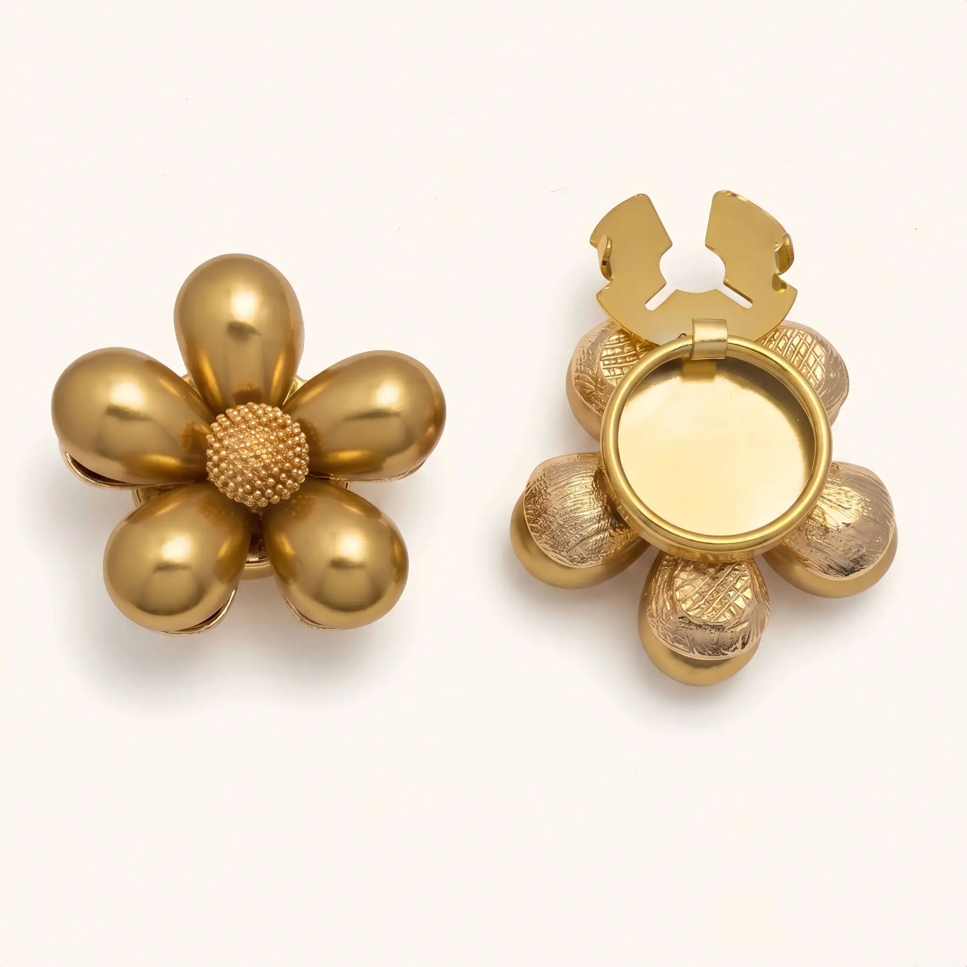 Glossy gold floral button cover with a textured gold core. The image highlights the open back clasp mechanism, demonstrating how it easily snaps onto shirt cuffs for a French-style finish without sewing.
