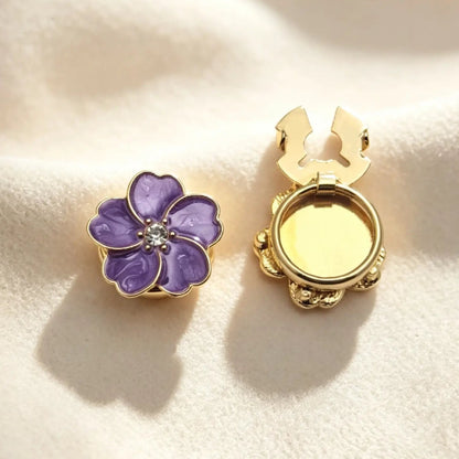 Elegant lavender purple enamel floral button cover featuring a marbled texture, gold edges, and a rhinestone center. Displays the open gold hinge mechanism, perfect as a light luxury faux cufflink.
