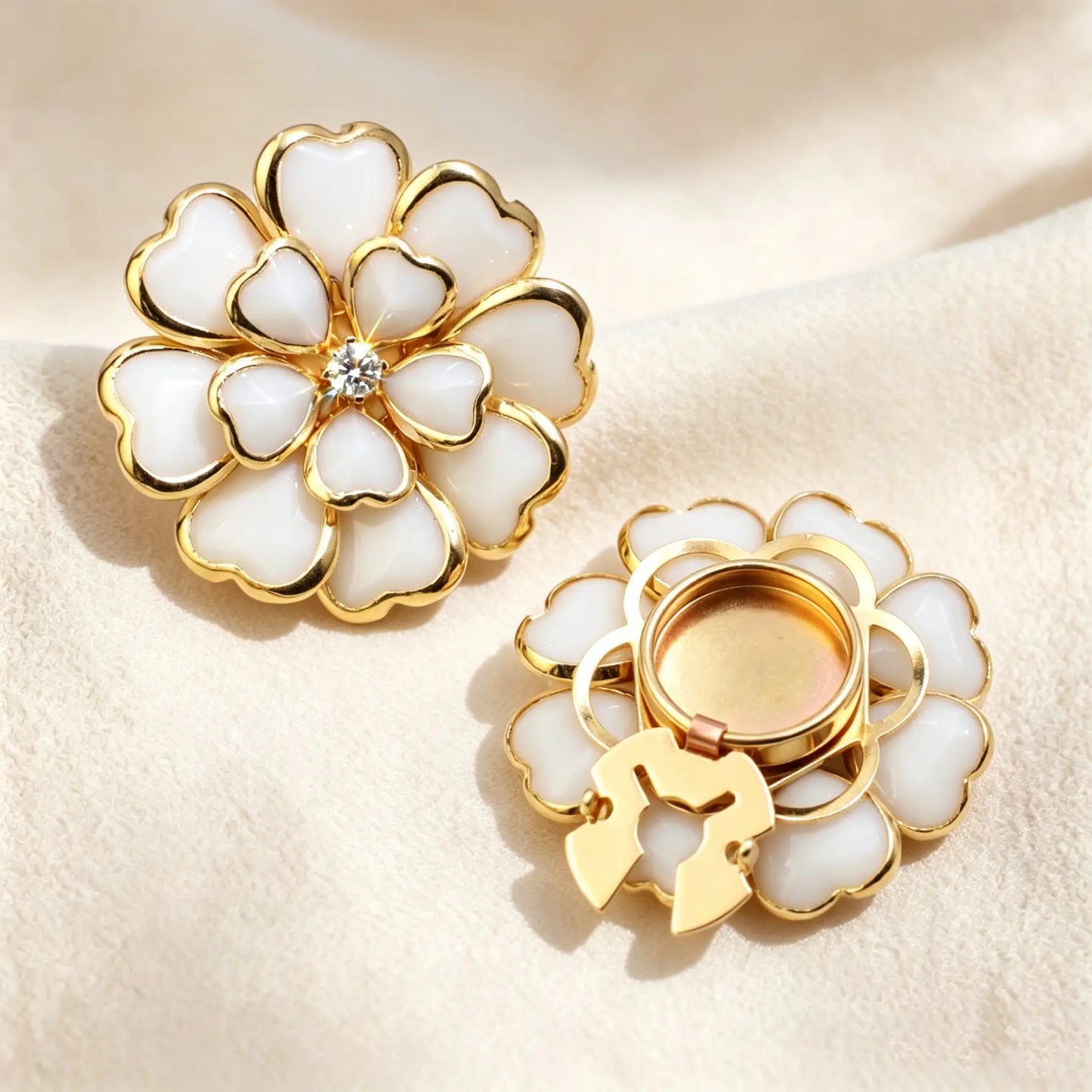 Classic milk white enamel layered floral button cover with delicate gold edging. The image shows the secure closed gold clip mechanism, offering a refined and versatile cufflink alternative.