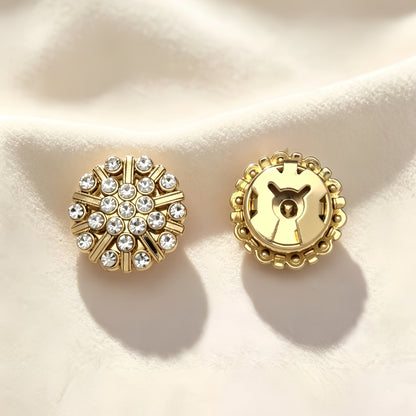 pair of light luxury vintage gold and rhinestone button covers. The image highlights the closed gold clip mechanism on the back, offering a refined, heavy-craftsmanship cuff upgrade under warm sunlight.