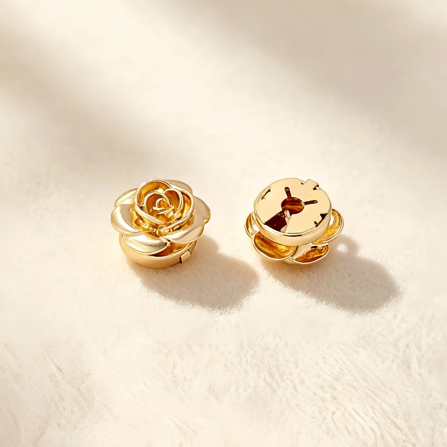 Close-up of a beautifully crafted gold rose faux cufflink. The image focuses on the securely closed attachment mechanism, ensuring this realistically proportioned floral accessory stays perfectly in place on shirt cuffs.