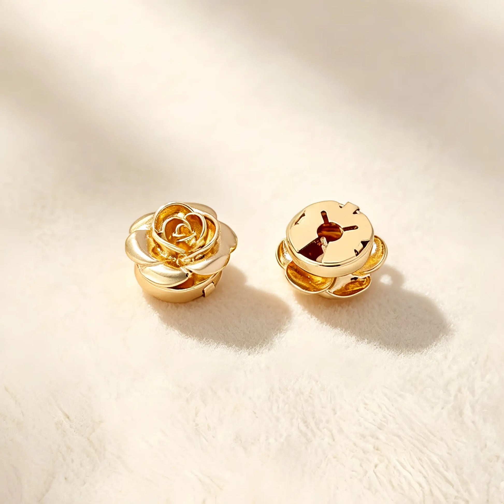 Close-up of a beautifully crafted gold rose faux cufflink. The image focuses on the securely closed attachment mechanism, ensuring this realistically proportioned floral accessory stays perfectly in place on shirt cuffs.